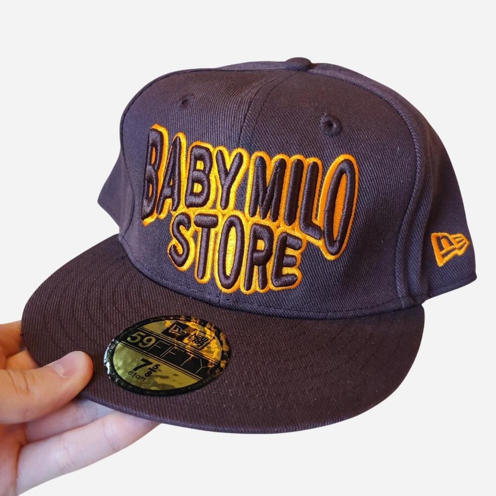 Bape Baby Milo Store New Era 59FIFTY cap with yellow 'BABY MILO STORE' text